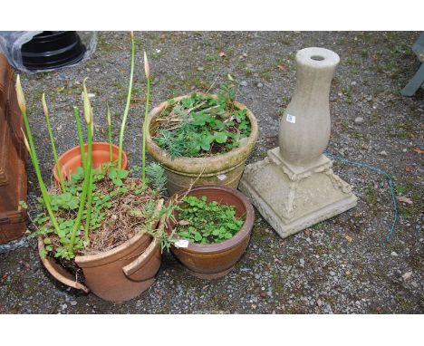 A concrete pedestal and a planter a/f.