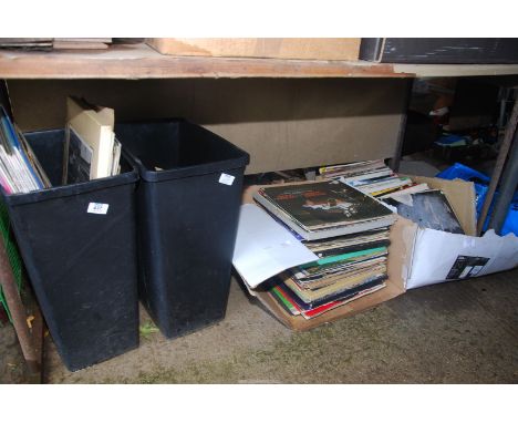 Four containers of LP's and gramophone records.