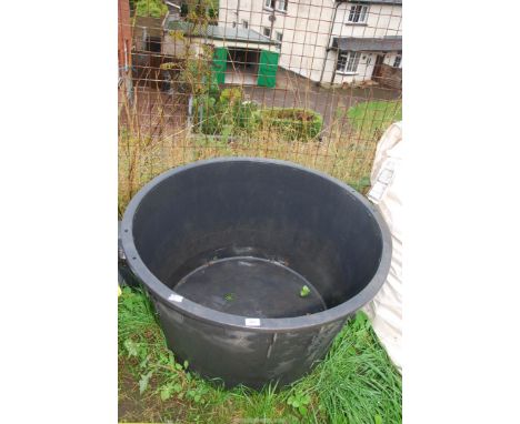 A large planter (plastic), 37" x 21".
