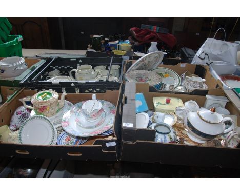 Four boxes of miscellanea items to include mixed china, clock, plates, butter dish etc.