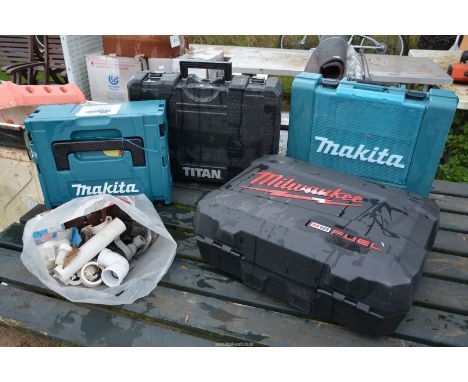 Five Power Tool Cases, Milwaukee, Makita, and Titan all empty plus bag of fittings.