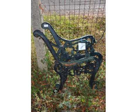 A pair of cast iron bench ends.