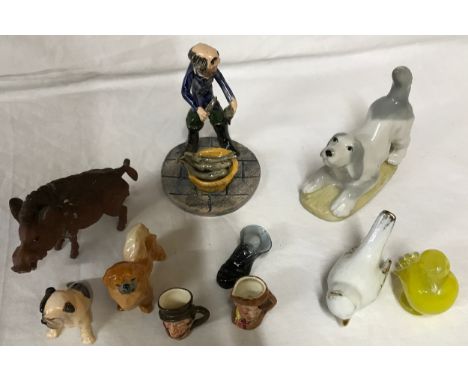 A collection of 10 ceramic figurines to include 2 x Royal Doulton miniature Toby jugs, Royal Doulton miniature Pug dog, Royal