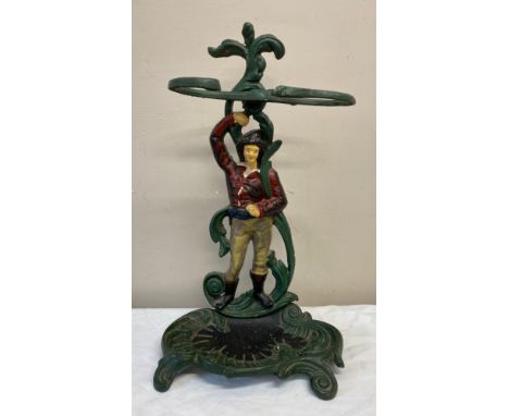 A cast iron painted umbrella/stick stand. With figure of gentleman to centre. 55cm  h x 31cm w.Condition ReportWith wear, gen