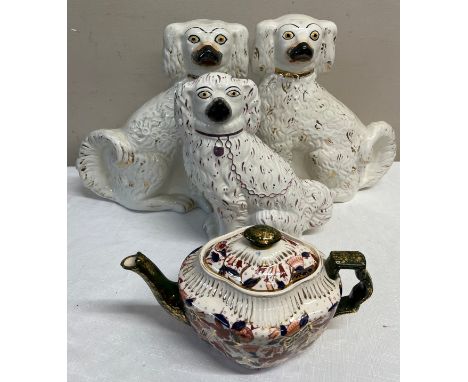 19thC ceramics including 3 Staffordshire dogs, a pair 32cm h, a single dog and a teapot.Condition ReportStar crack to base of