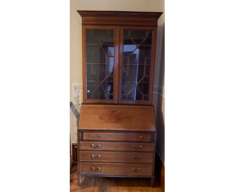 Edwardian mahogany inlaid bureau bookcase. Glazed 2-door bookcase over 4 graduated drawers. 91cms h.Condition ReportDetached 