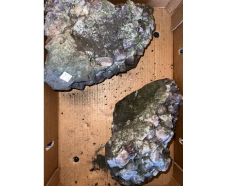 Two large pieces of Amethyst Crystal Rock one measuring 24cms w x 27cms l x 17cms h and the other 18cms w x 31cms l x 18cms h