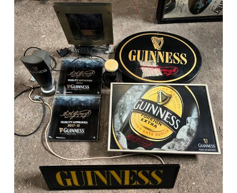 A quantity of Guinness signage to include 5 light up. Guinness foreign extra sign 42 x 60cm. (8)