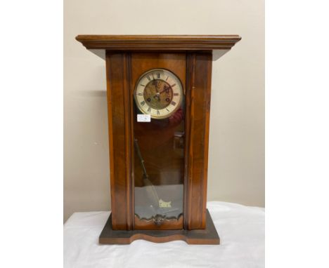 A Vienna wall clock with Art Nouveau decoration to pendulum. 58cm h.Condition ReportTicks.