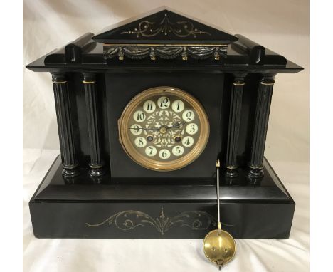 French black slate mantel clock 30.5cms h x 36cms w, 14.5cms deep.Condition ReportHas pendulum, no key. Cracked repair to roo