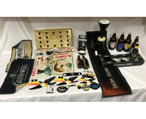 Guinness collection, Carlton Ware wall toucans, table lamp, bar bottle stand, towels, sponge mat, clothes brushes, enamel bad