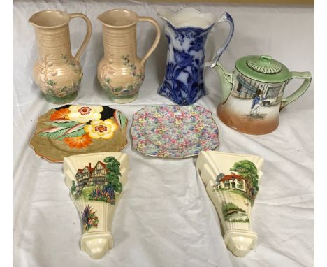 A ceramic selection to include: pair Royal Winton wall vases, pair of Melba Springtime jugs 21cm, Crown Devon floral painted 