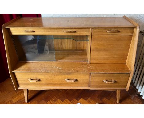 A G Plan sideboard, sliding glass doors and drawers with pull down door. 122 w x 95 h x 48cm.Condition ReportWatermarked.