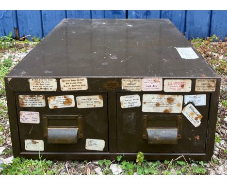 A 1970's metal two drawer filing cabinet, label for Art Metal Steel Office Furniture London. 51cm d x 41cm w x 18cm h.