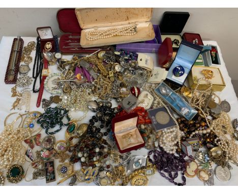 A large quantity of costume jewellery, spoons, geometry set, collar studs, watches etc.Condition ReportSome items showing sig