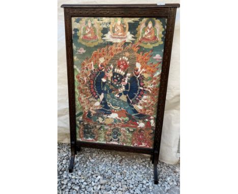 Fine quality 18/19thC Buddhistic Tibeta-Chinese watercolour framed in a 20thC firescreen. 61 x 39cm sight size. Small areas o