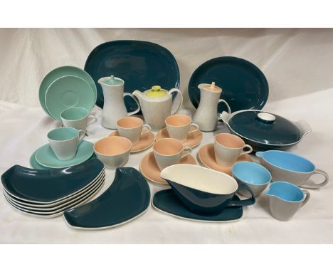 Various vintage Poole part tea and dinner service to include lidded tureen, jugs, cups and saucers, coffee and teapots, gravy