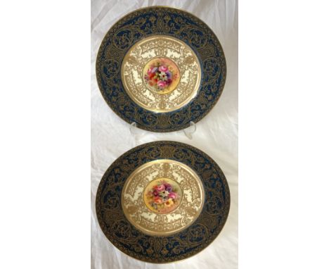 Two Royal Worcester hand painted plates 27cm d depicting flowers. Signed J StanleyCondition ReportGood condition no noticeabl