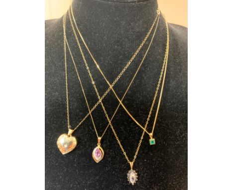 Four 9ct gold chains with pendants to include emerald, amethyst, gold-plated heart and sapphire.Condition ReportGood conditio