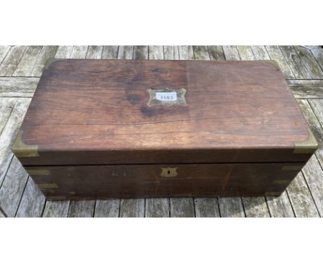Mahogany brass bound writing box 49.5cms l x 25cms w x 17cms high. Five internal wells, three drawers, leather writing slope.