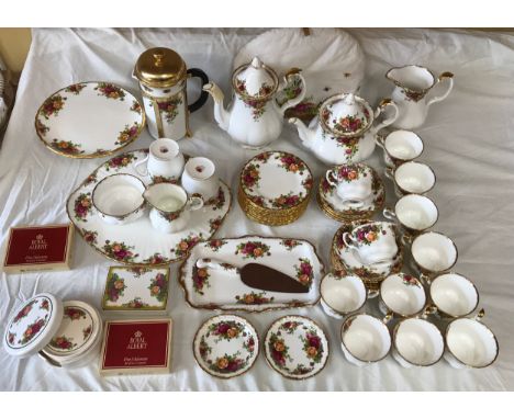 A Royal Albert Old Country Roses bone china part tea and coffee service to include: cafetiere 25cm h, coffee pot 26cm, teapot