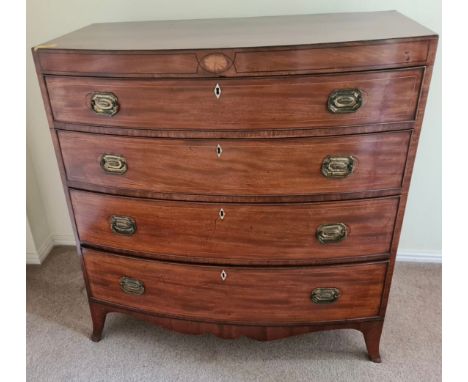 A 19thC mahogany bow front 4 drawer chest of drawers. 107 h x102 w x 54cm d.Condition ReportVeneer missing to legs.