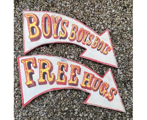Two vintage style comical circus arrow signs 'Free Hugs' and 'Boys Boys Boys', by repute hand cut and painted in Cornwall by 