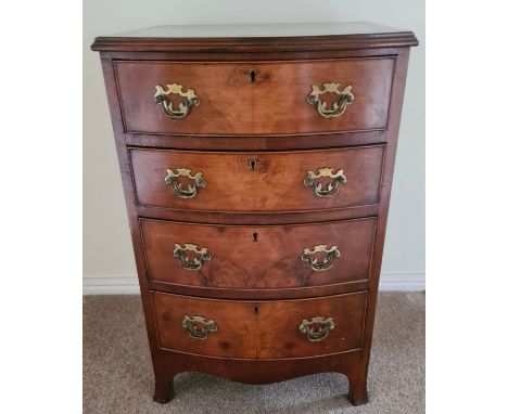 A 4 height chest of drawers on bracket feet. 73 h x 45 w x 41cm d.,