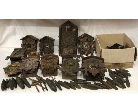 Box of 12 Cuckoo Clock Frames incl weights, pendulums etc for spares and repairs.Condition ReportBroken and incomplete