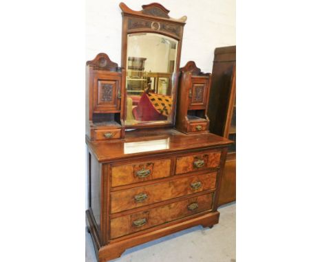 A burr walnut Edwardian dressing chest, with large central rectangular mirrored section with two cupboard stand to each side 