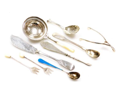 A group of various silver cutlery and trinkets, to include a silver and blue enamelled spoon, as silver and mother of pearl h