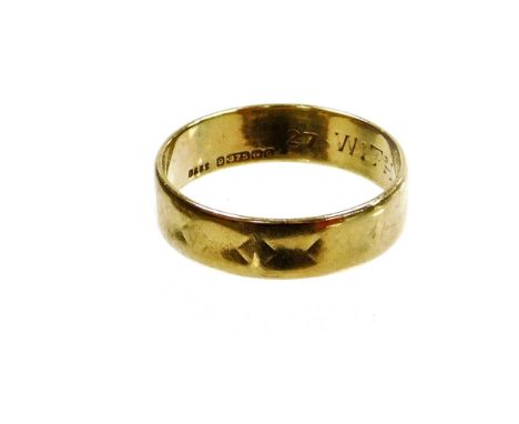 A 9ct gold wedding band, of hammered design but rubbed with engraving 'with love from Alfred', Birmingham 1990, ring size R½,