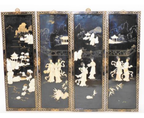 A set of four Oriental black lacquered and mother of pearl inlaid panels, each with figures and building scenes, on a pattern