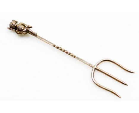 A silver Imp handled toasting fork, the Imp emblem above a three prong fork on a twist stem, maker's stamp TEH, Birmingham 19