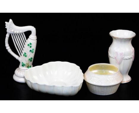 A group of third green mark period Belleek wares, including a heart shaped dish, a Cleary sugar basin, a Georgian shell viole