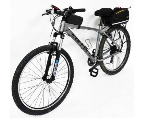 A Carrera SR Suntour gent's mountain bike, with Shimano fourteen speed gears, saddle bag, phone pouch, light, etc. Note: VAT 
