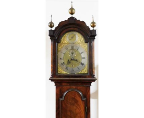 A George III framed mahogany longcase clock, with ball and spike adorned hood, full length trunk door with arch, plain base w