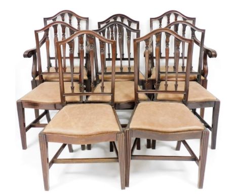 A set of eight Chippendale style dining chairs, each with mahogany arrow and carved back, with drop in leather upholstered se