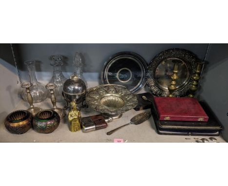 A mixed lot to include a hip flask, carnival glass, silver manicure part set, silver plated candlesticks and other itemsLocat