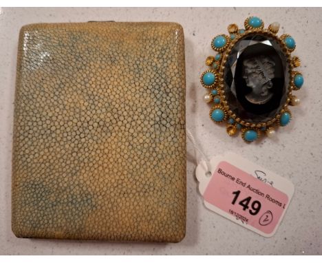 A ladies silver plated and shagreen cigarette case together with a vintage Nina Ricci brooch in the style of a Victorian blac