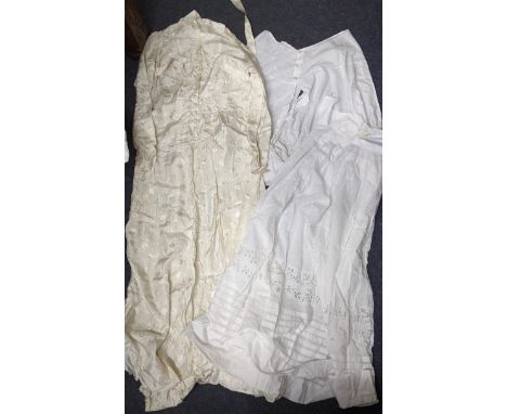 An early 20th Century white cotton christening gown, a pair of early 20th Century white cotton bloomers with frilled hem and 