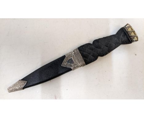 A mid 20th century Scottish silver mounted sgian dubh dagger hallmarked Edinburgh 1978 inset with a citrine and Celtic knot d