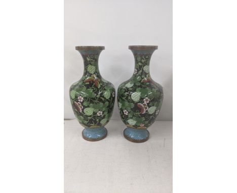 A pair of Japanese cloisonne enamel vases decorated with butterflies and foliage, 17cm h Location:If there is no condition re
