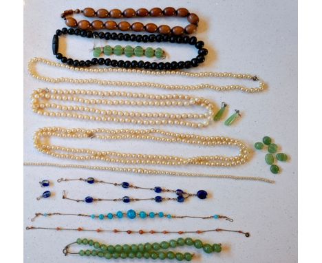 Mixed vintage bead jewellery to include extra long simulated pearl necklaces, a pair of jade drop earrings, wooden bead neckl