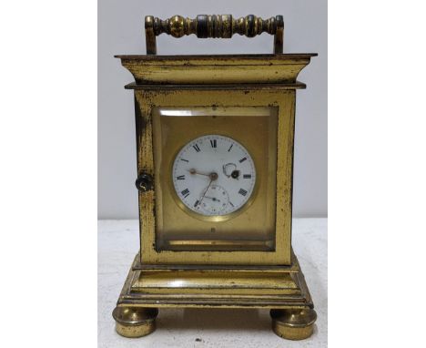 A brass cased carriage clock fitted with a 19th century pocket watch movement signed Wrightman, London, 15h x 10WLocation: 9.