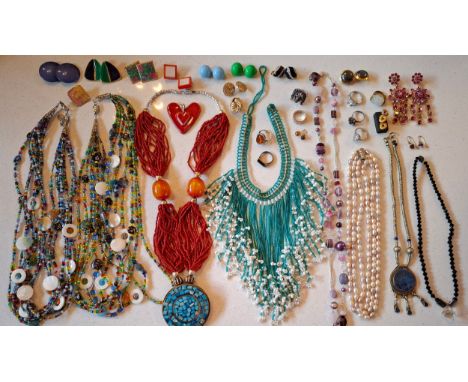 A quantity of vintage jewellery, mainly mid to late 20th Century bead necklaces and earrings, to include a pink 3-strand simu