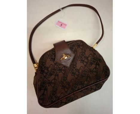 Vivienne Westwood-A vintage brown cloth and brown leather shoulder bag having a black outline pattern of crowns and orbs, app