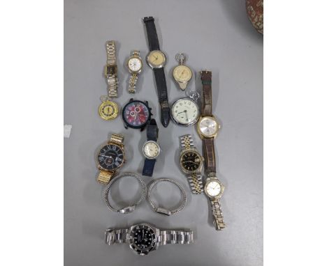 Various gentleman's and ladies fashion wristwatches, with a vintage map measurer Location:If there is no condition report sho