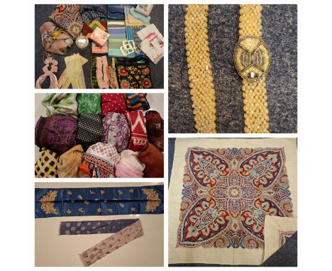 A quantity of vintage scarves to include silk examples, a 1960's green Ascher scarf, a vintage wool mix paisley scarf and a J