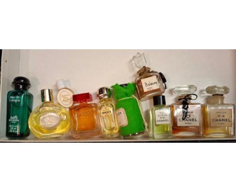 A collection of miniature fragrances to include Chanel, Balmain, Givenchy, Hemes, Christian Dior and Raphael Demon. Location: